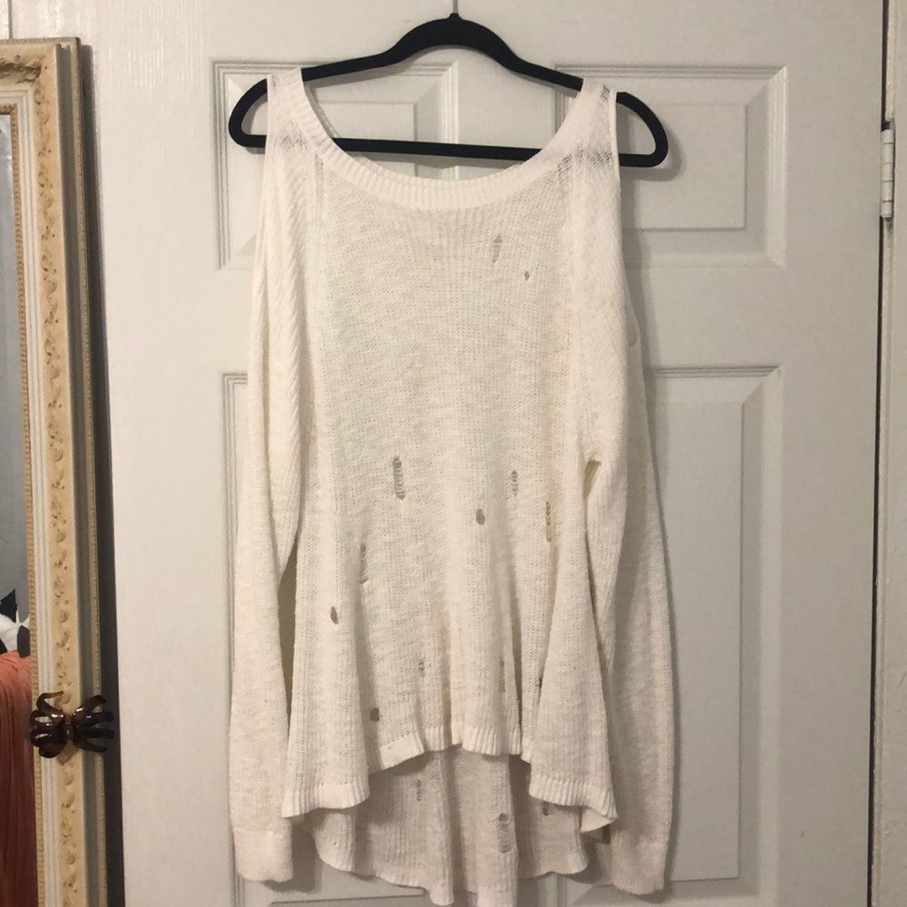 Distressed off the shoulder sweater